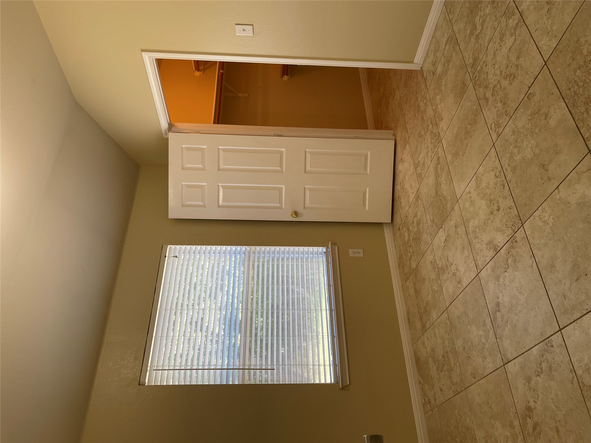 Undisclosed Address Austin, TX 78729 - Photo 8 of 8 Unfurnished bedroom featuring a walk in closet and vaulted ceiling