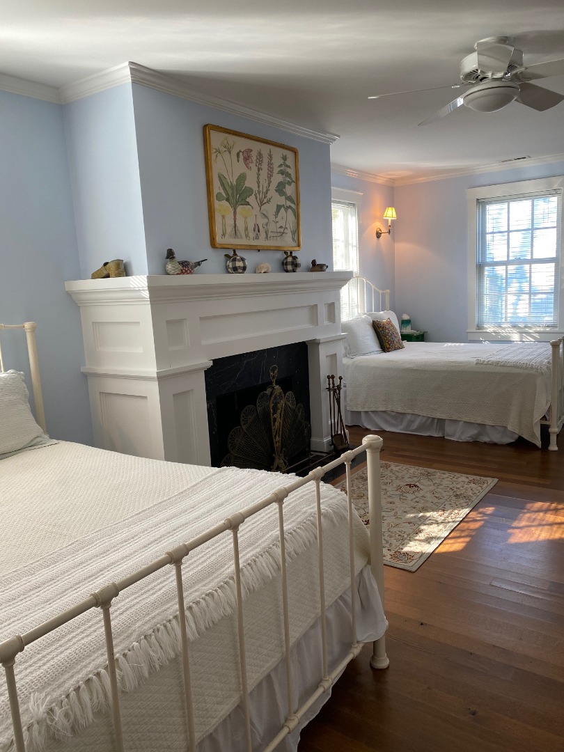 12 Spring Street Vineyard Haven, MA 02568 - Photo 11 of 40 a living room with furniture and a fireplace