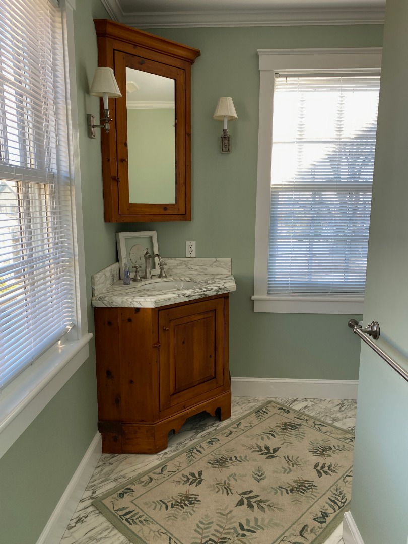 12 Spring Street Vineyard Haven, MA 02568 - Photo 18 of 40 a bathroom with a sink and a mirror
