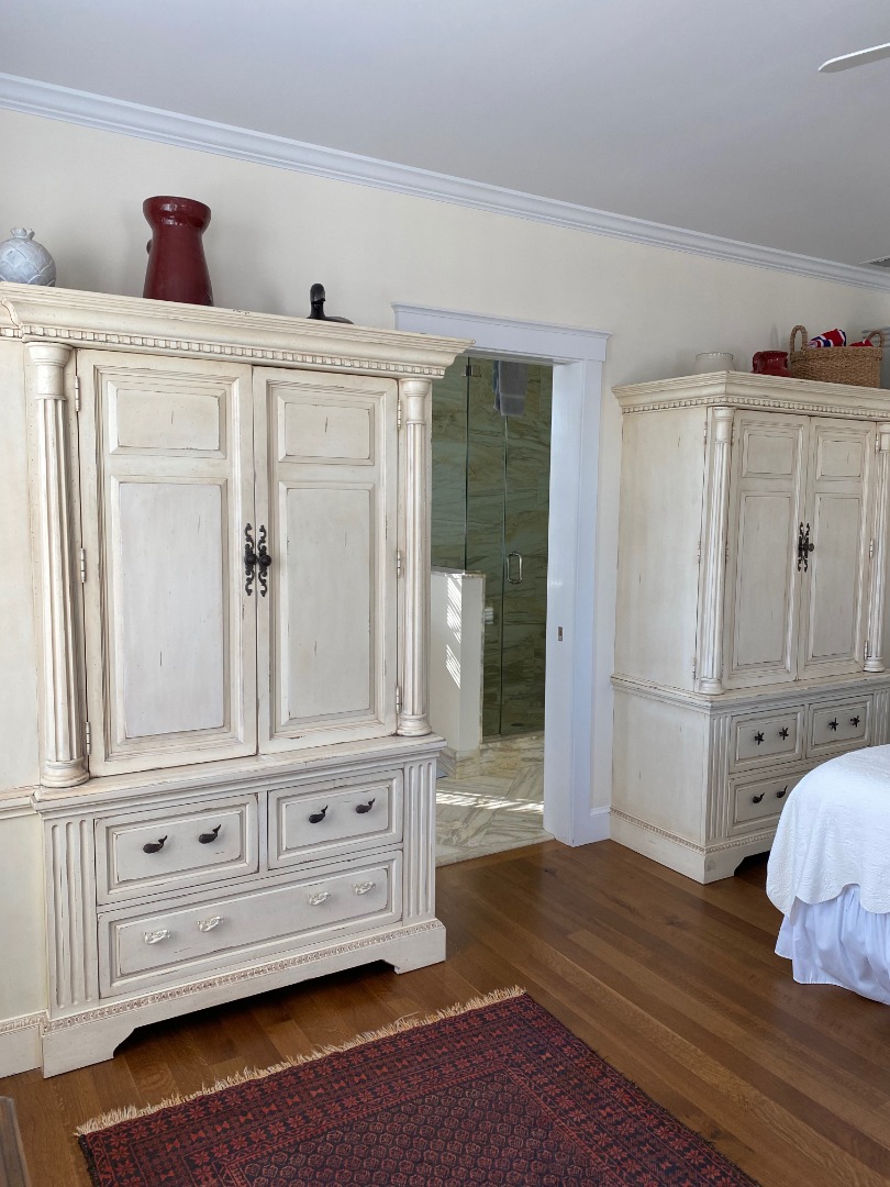 12 Spring Street Vineyard Haven, MA 02568 - Photo 21 of 40 a view of a closet with wooden floor