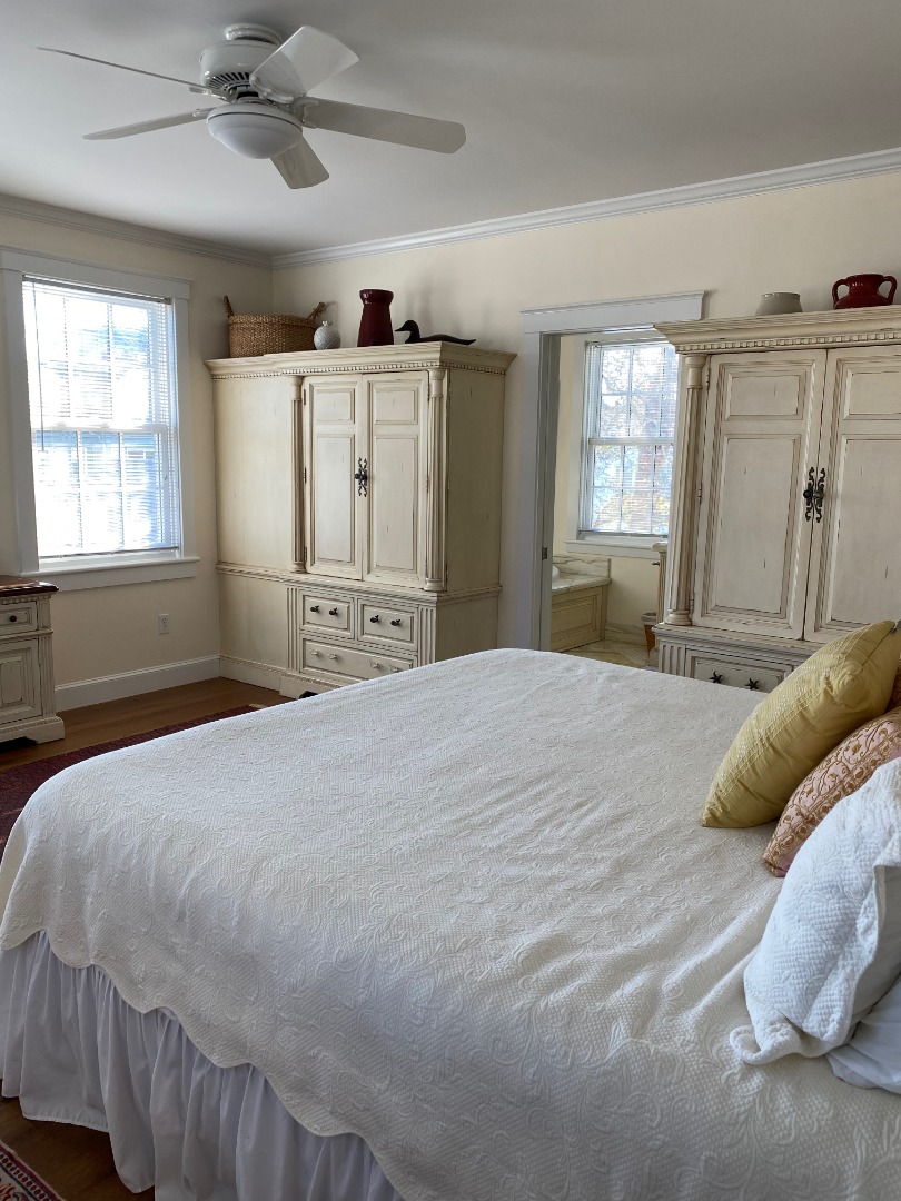 12 Spring Street Vineyard Haven, MA 02568 - Photo 22 of 40 a bedroom with a bed and window