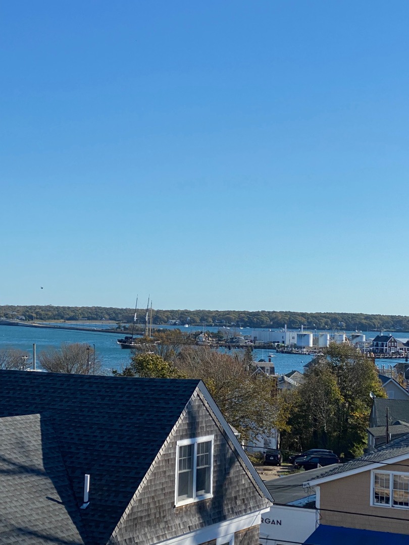12 Spring Street Vineyard Haven, MA 02568 - Photo 28 of 40 a view of a city from a balcony with outdoor space