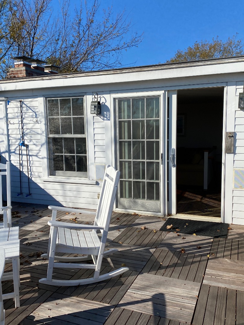 12 Spring Street Vineyard Haven, MA 02568 - Photo 29 of 40 a view of house with wooden floor and windows