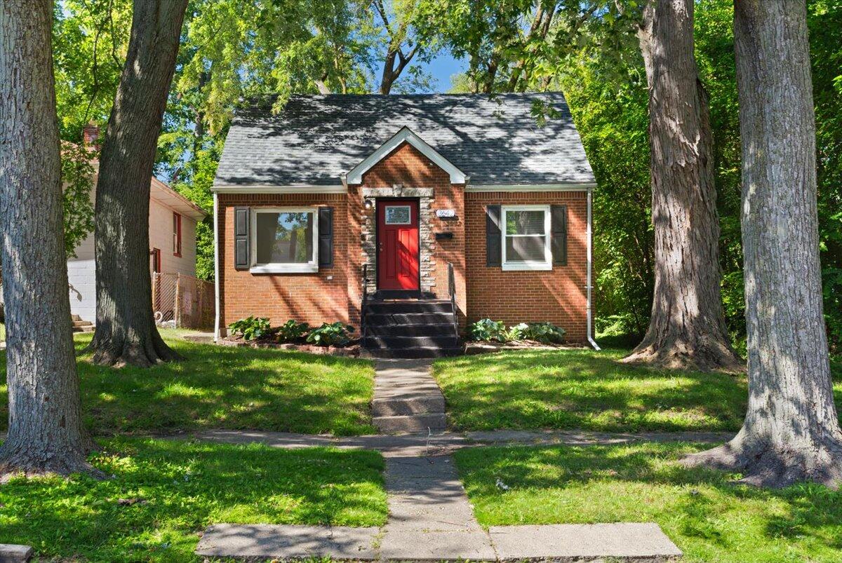 a front view of house with yard