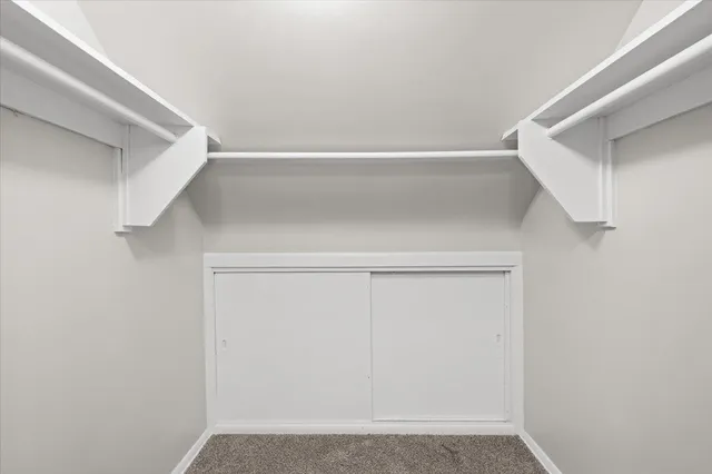 a view of small space with racks on the wall