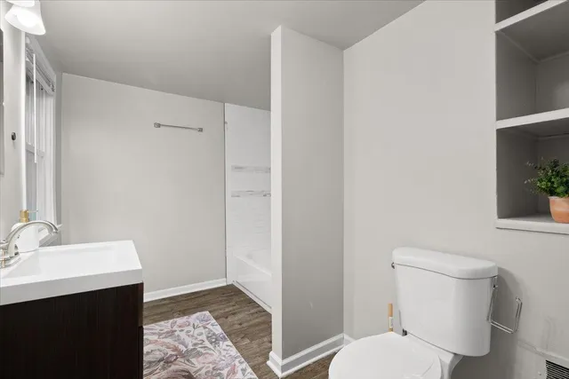 a bathroom with a sink and a toilet