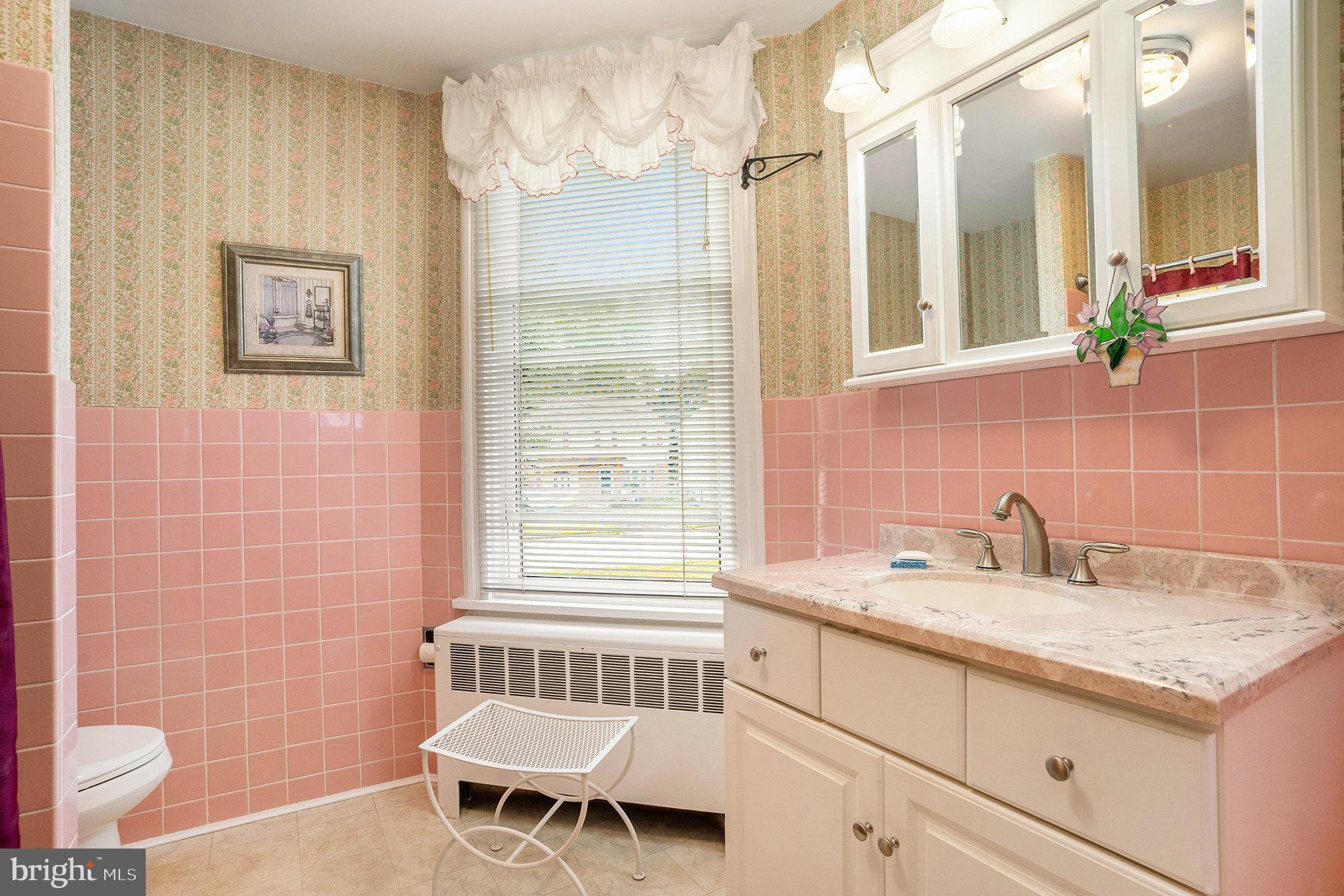 1640 Walnut Avenue Oreland, PA 19075 - Photo 20 of 45 a bathroom with a sink and a mirror