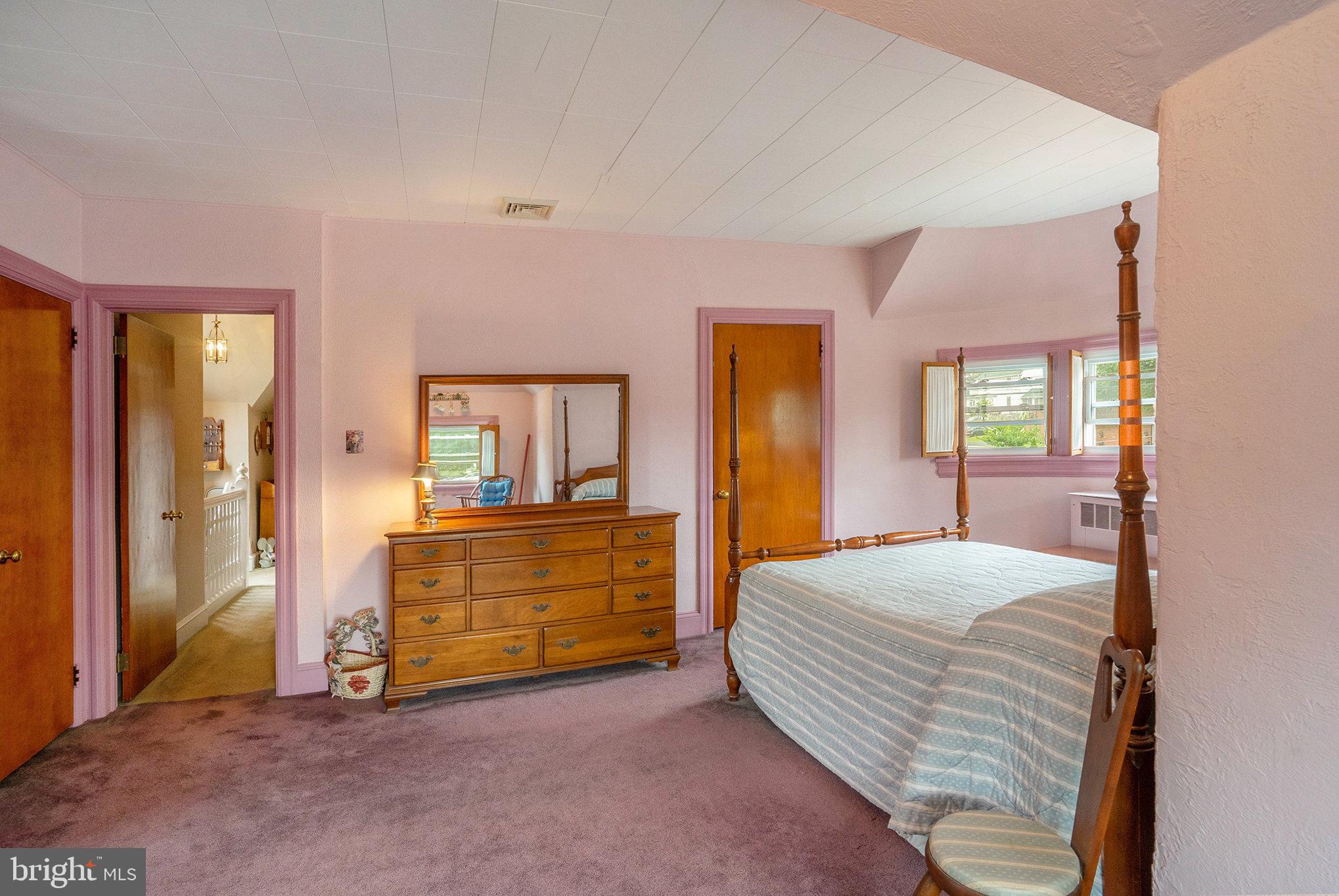 1640 Walnut Avenue Oreland, PA 19075 - Photo 25 of 45 a bedroom with a bed and a table