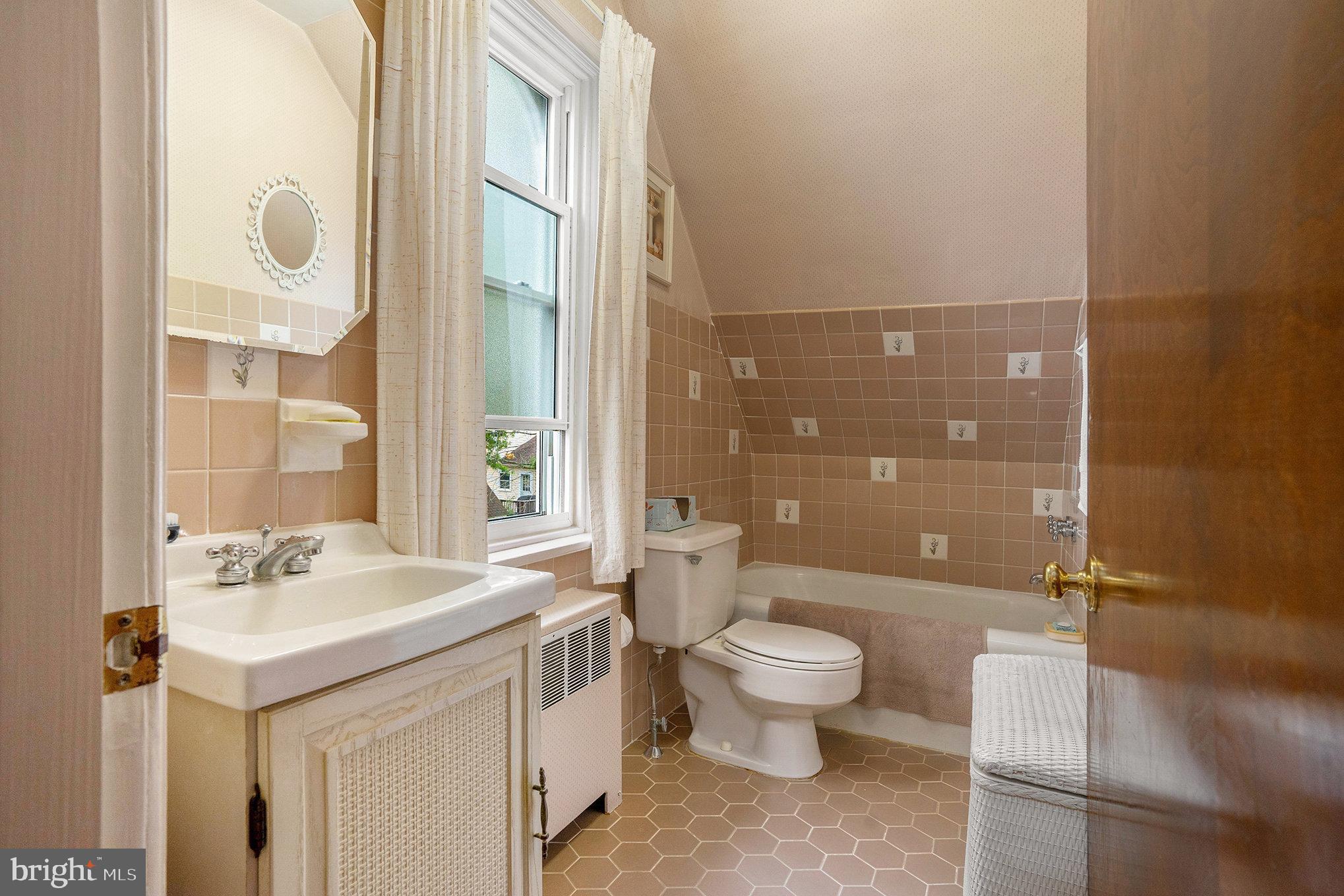 1640 Walnut Avenue Oreland, PA 19075 - Photo 27 of 45 a bathroom with a sink toilet and shower