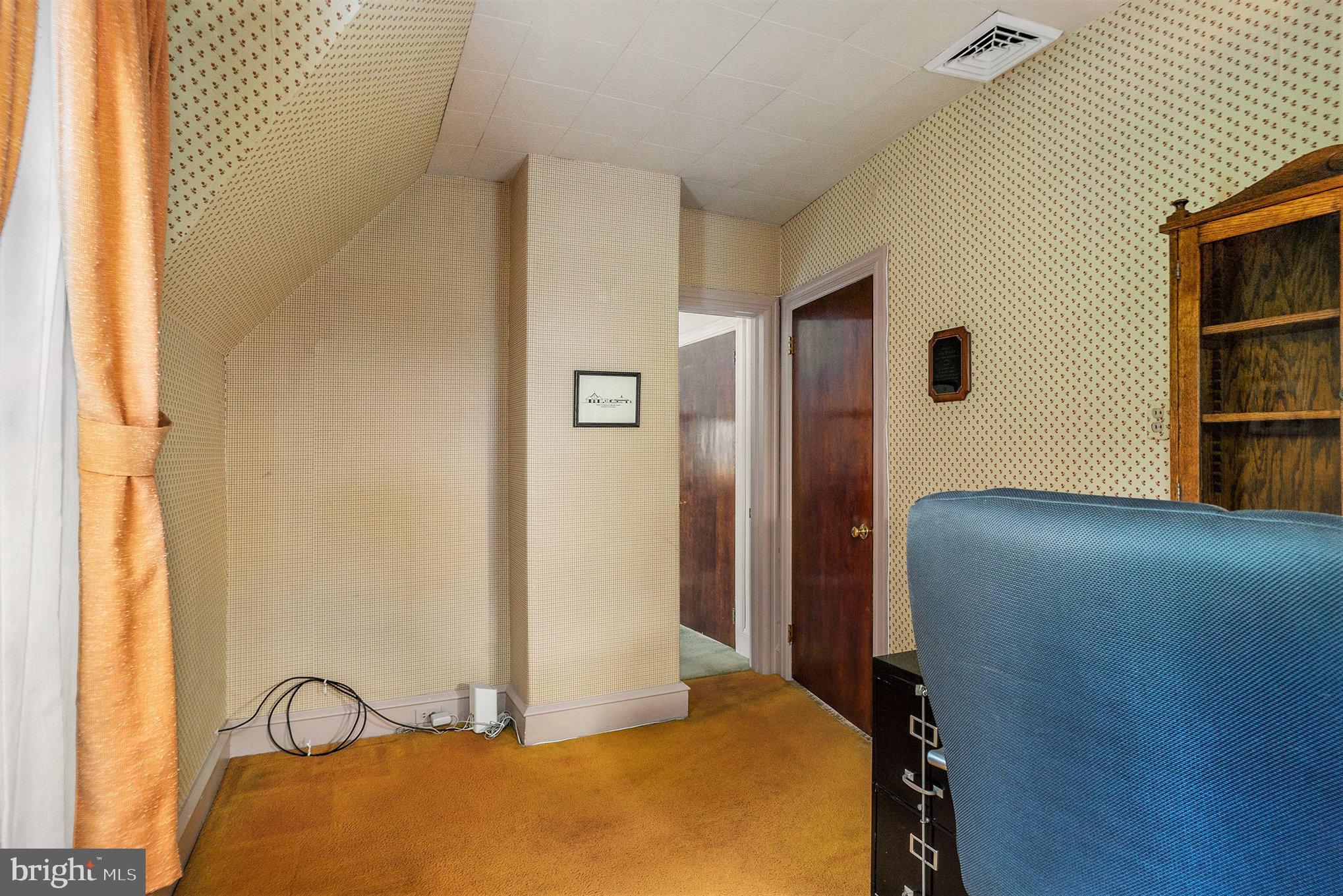 1640 Walnut Avenue Oreland, PA 19075 - Photo 32 of 45 a bedroom with a bed and a window