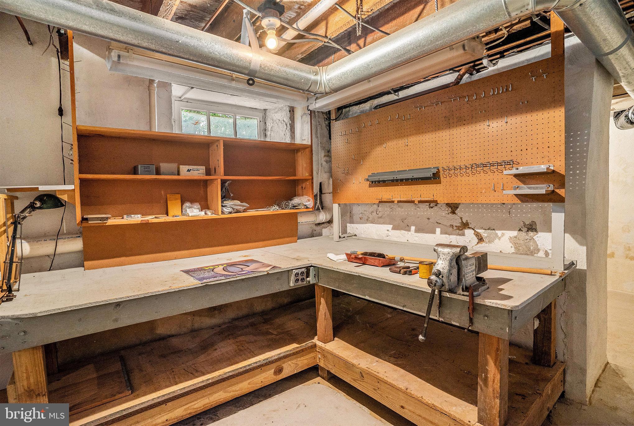1640 Walnut Avenue Oreland, PA 19075 - Photo 35 of 45 a view of a living room with a stove and a window
