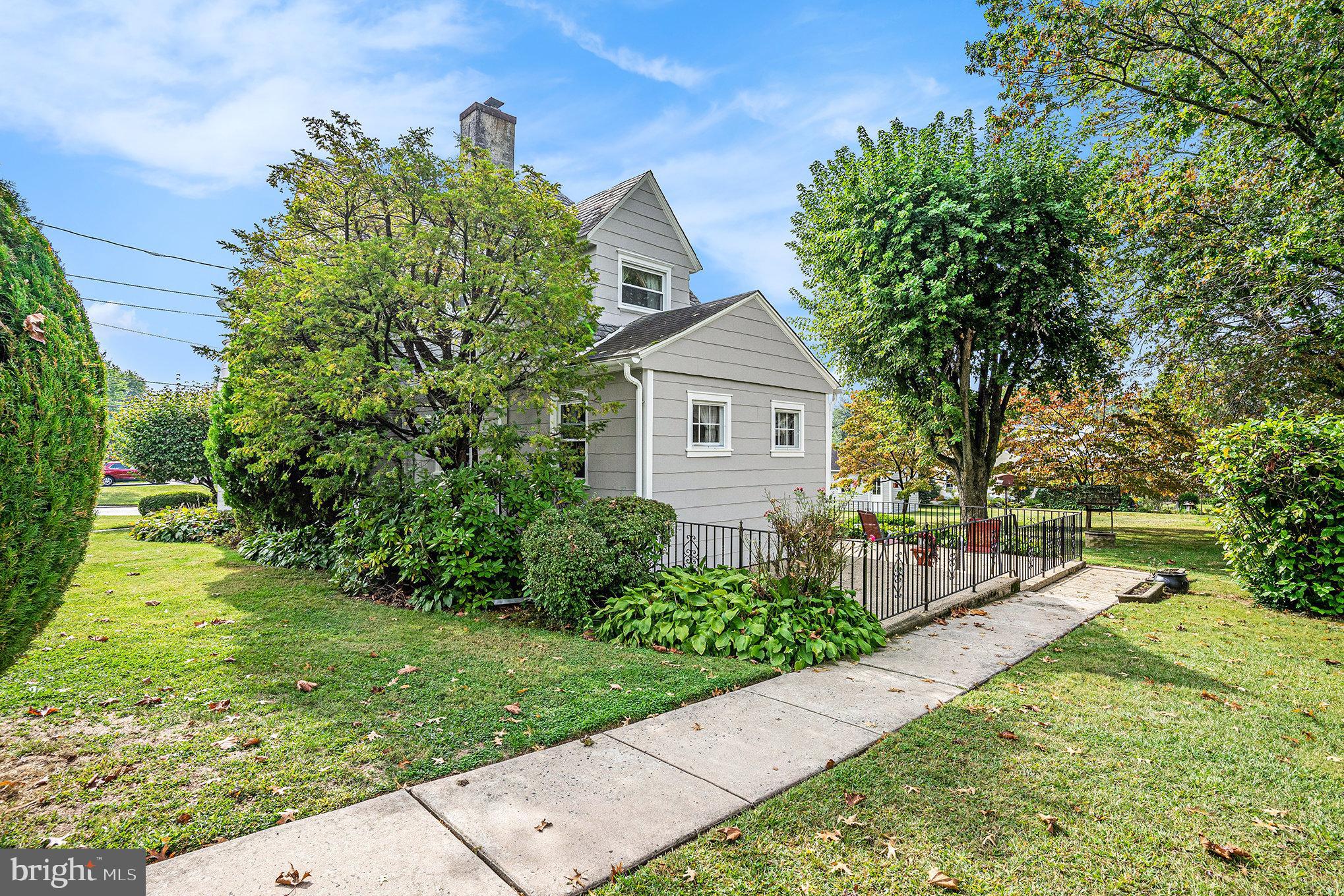 1640 Walnut Avenue Oreland, PA 19075 - Photo 38 of 45 a front view of a house with garden