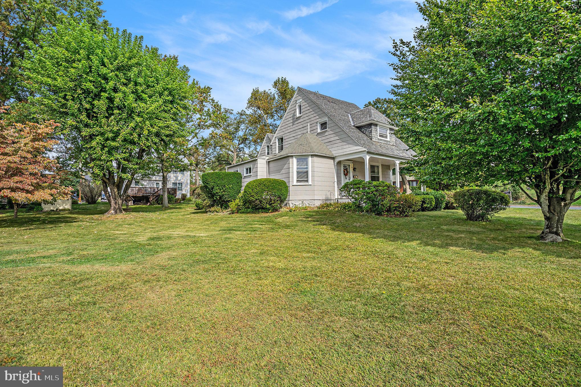 1640 Walnut Avenue Oreland, PA 19075 - Photo 4 of 45 a front view of house with garden