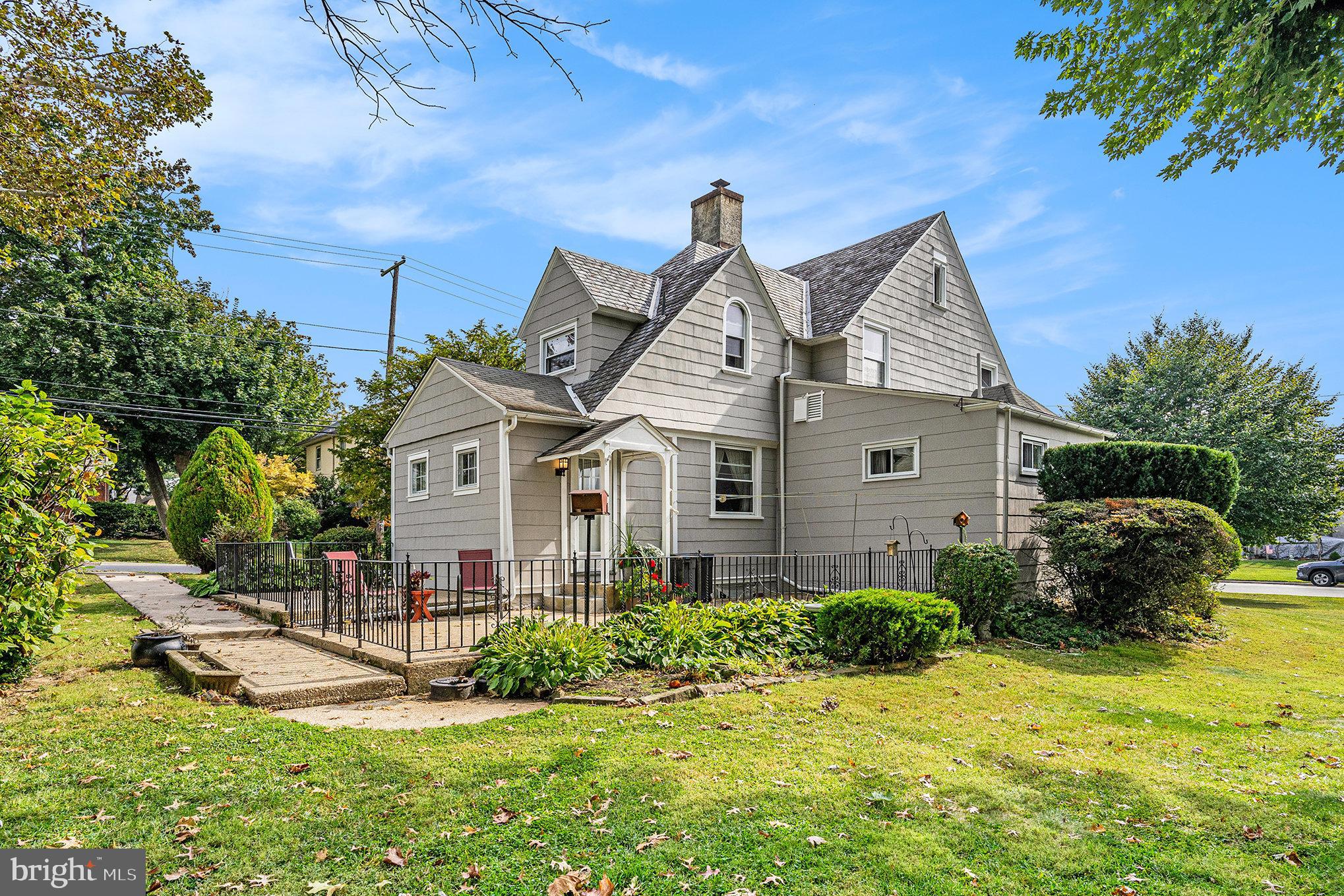 1640 Walnut Avenue Oreland, PA 19075 - Photo 42 of 45 a front view of a house with a yard