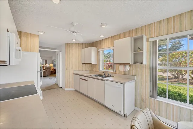 a view of a livingroom with furniture and window