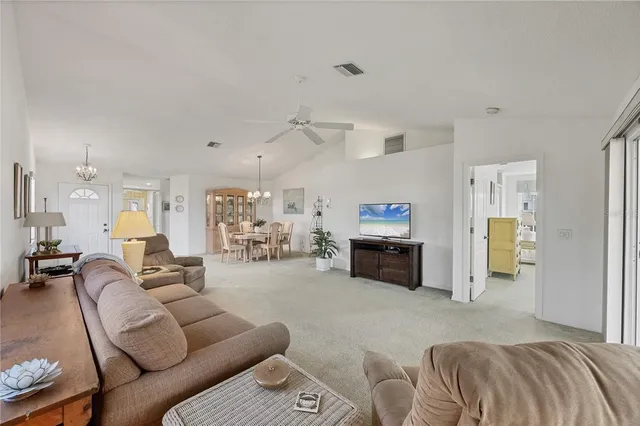 a room with view of water heater and a floor to ceiling window