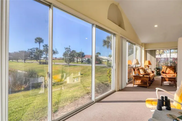 a kitchen with sink cabinets and dining table