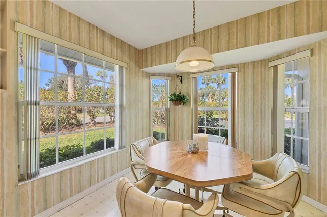 a bathroom with a sink toilet a mirror and shower