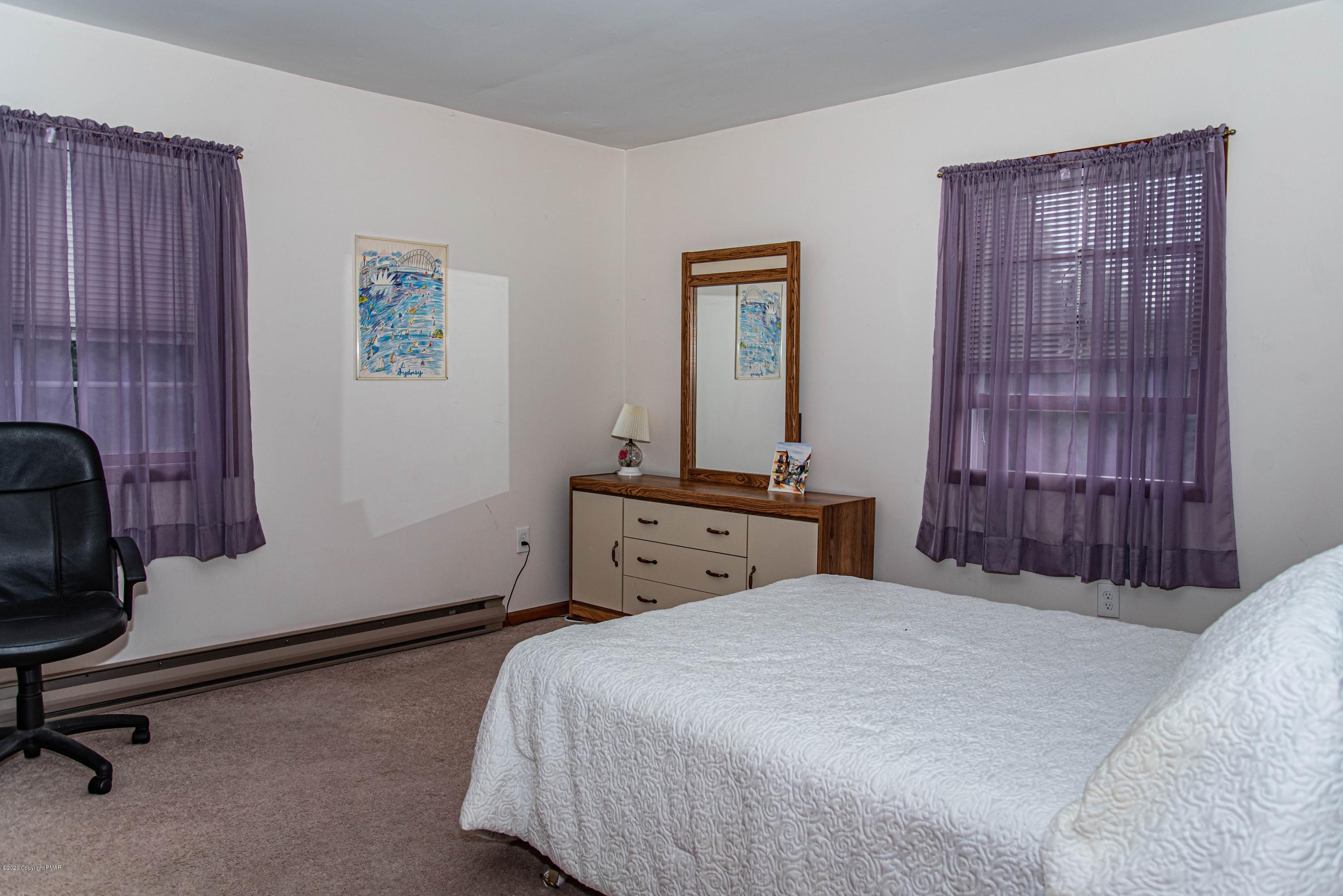 187 Old Stagecoach Road Gilbert, PA 18331 - Photo 17 of 31 a bedroom with a bed and a dresser