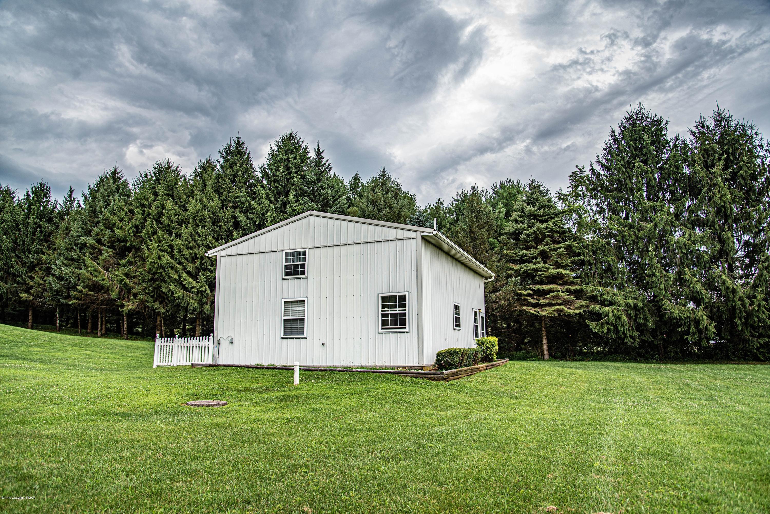 187 Old Stagecoach Road Gilbert, PA 18331 - Photo 25 of 31 a view of a house with backyard