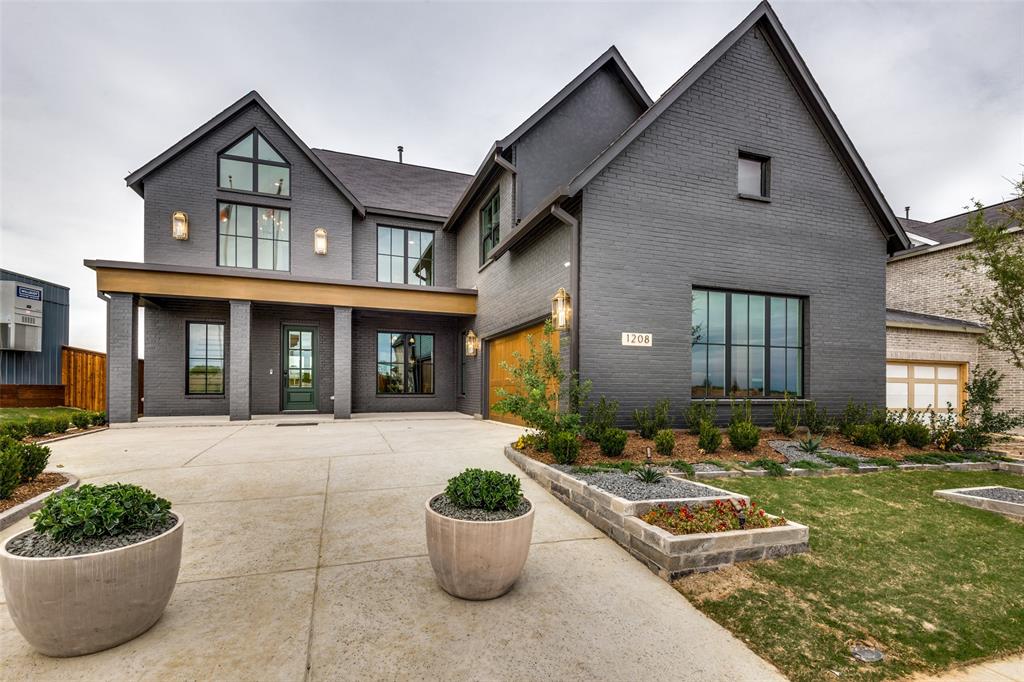 1208 Yellow Pne Road Celina, TX 75009 - Photo 1 of 1 a front view of a house with patio