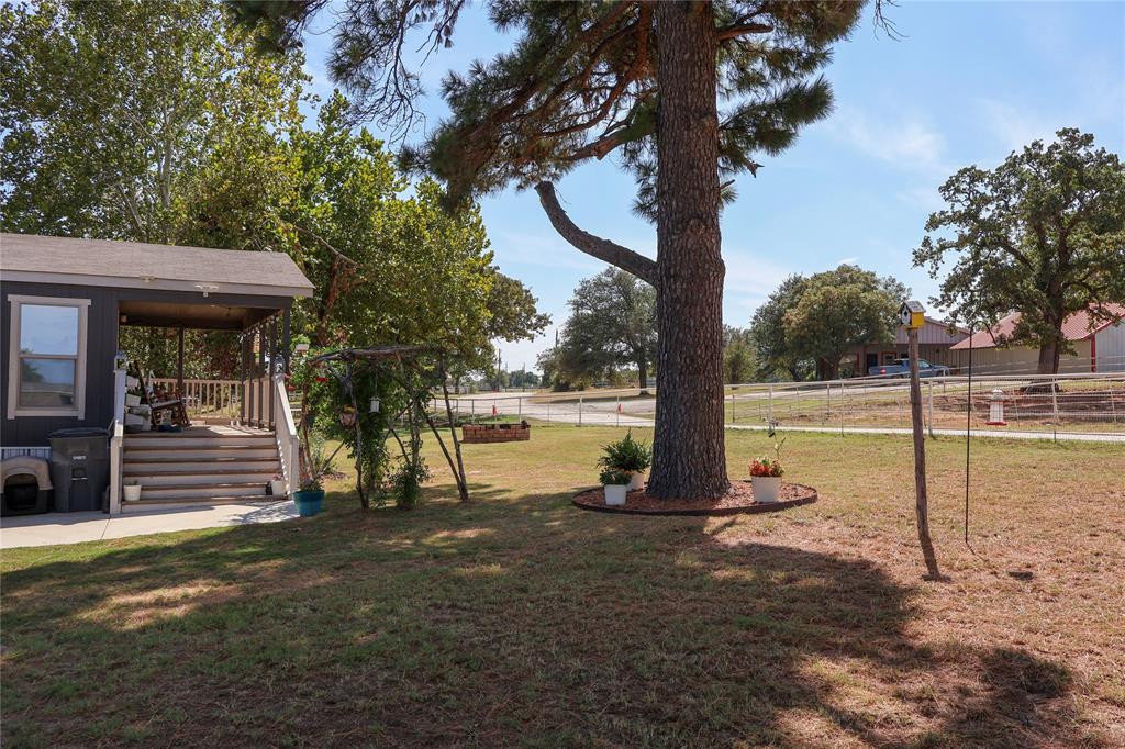 130 Firefly Drive Springtown, TX 76082 - Photo 21 of 25 a view of a park with slide