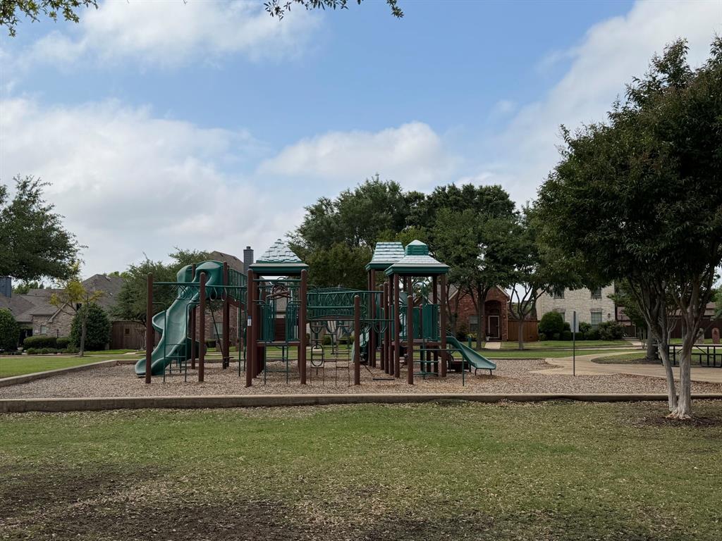 2003 Downing Street Allen, TX 75013 - Photo 37 of 40 And just a short walk away, you will also find this amazing park with playground, picnic tables and walking paths!