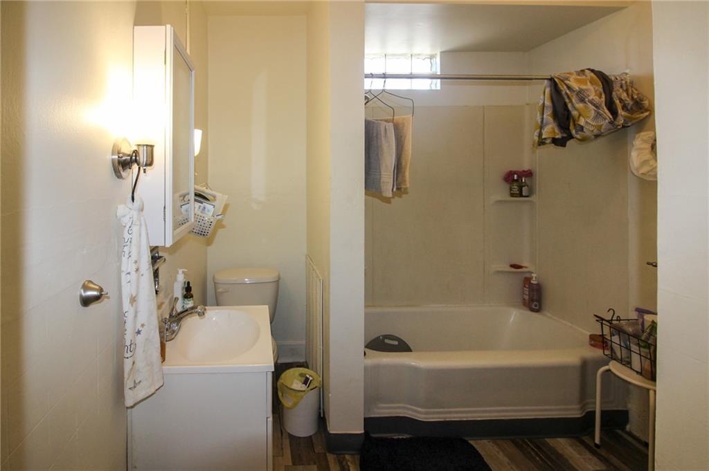 244 Center Street Springdale, PA 15144 - Photo 18 of 32 a bathroom with a bathtub and shower