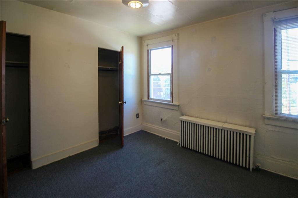 244 Center Street Springdale, PA 15144 - Photo 26 of 32 an empty room with windows