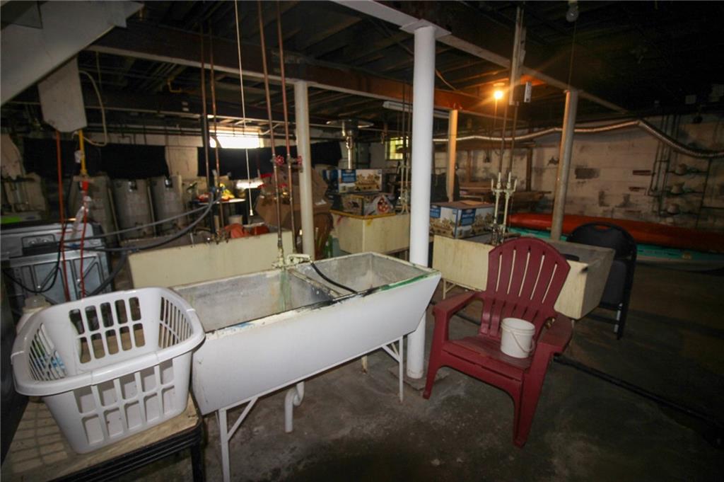 244 Center Street Springdale, PA 15144 - Photo 28 of 32 a view of a chair and tables in the patio