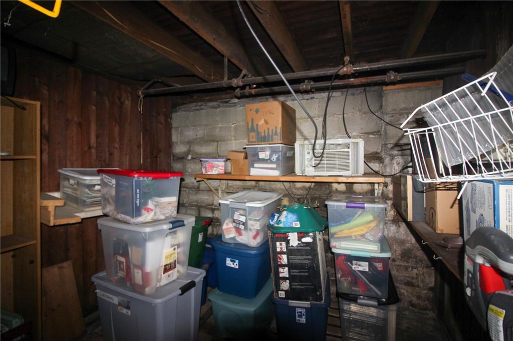 244 Center Street Springdale, PA 15144 - Photo 29 of 32 a view of store room with washer and dryer
