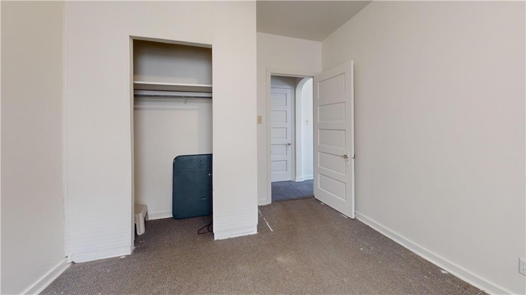 244 Center Street Springdale, PA 15144 - Photo 6 of 32 a view of a hallway with closet