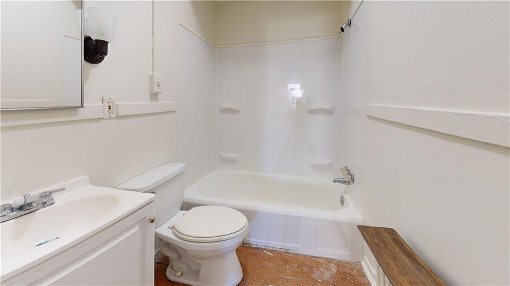 244 Center Street Springdale, PA 15144 - Photo 10 of 32 a bathroom with a sink toilet and shower