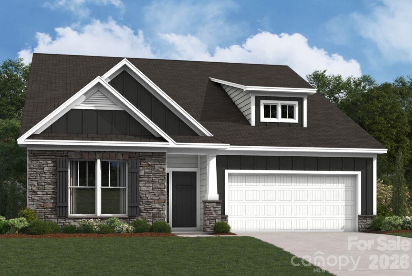 1522 Kate Cecil Way York, SC 29745 - Photo 1 of 3 a front view of a house with a yard and garage