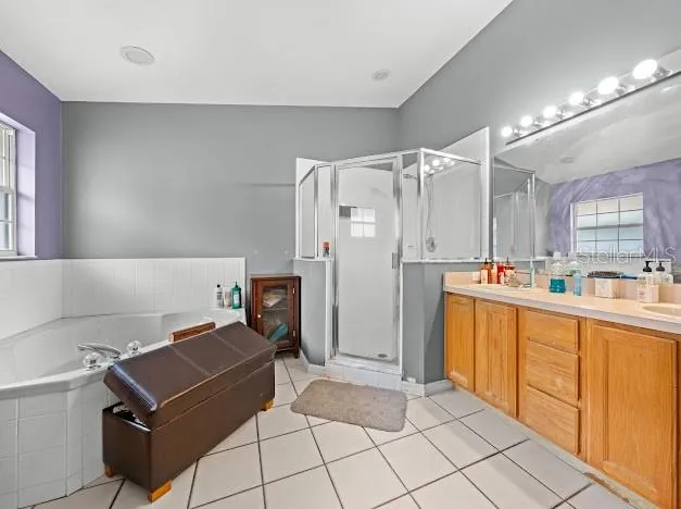 a kitchen with cabinets and refrigerator