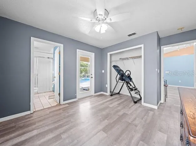 a view of a room with window and wooden floor