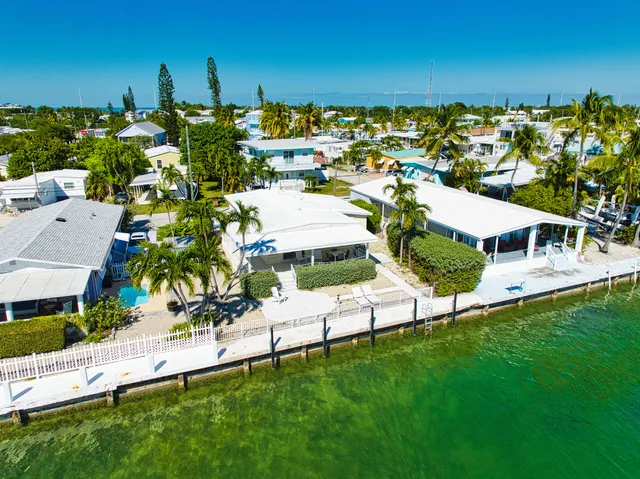 a view of a chairs and table on the terrace