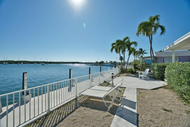 a view of a lake with a outdoor space
