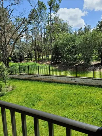a view of a bench in a park