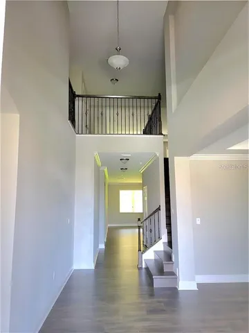 a view of entryway with wooden floor