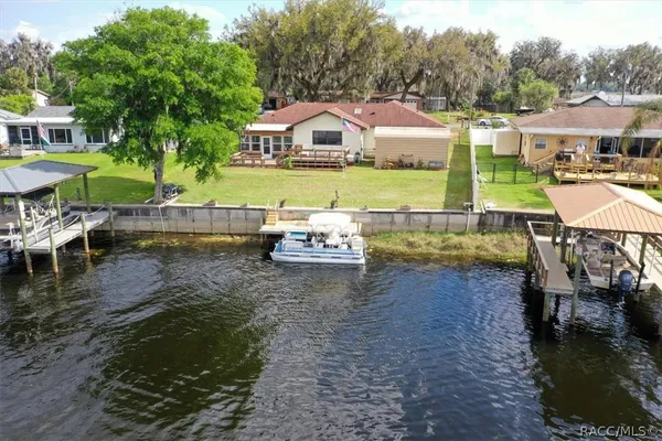 a view of a house with a big yard