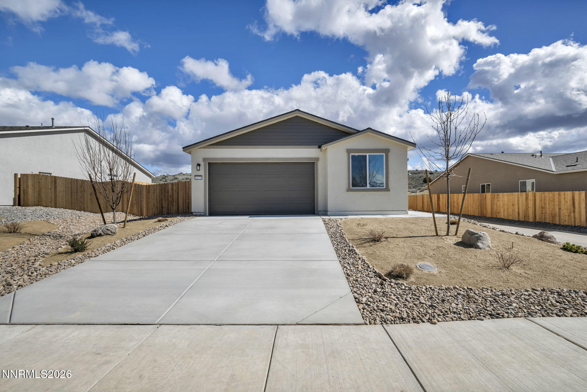 a view of a house with a snow in the yard