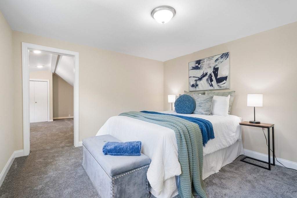 31 Terrace Drive Worcester, MA 01609 - Photo 20 of 42 a bedroom with a bed and lamp