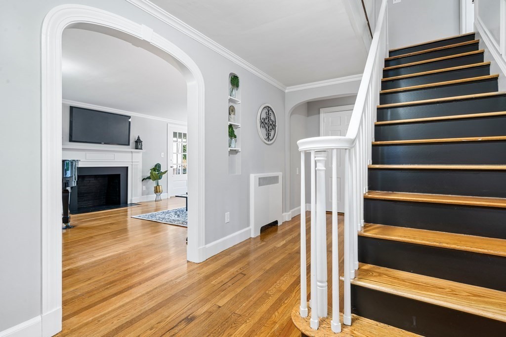 31 Terrace Drive Worcester, MA 01609 - Photo 2 of 42 a view of a livingroom with wooden floor and a fireplace