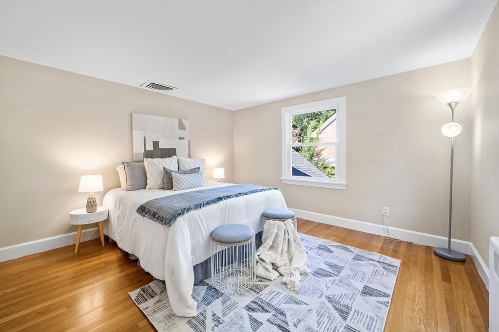 31 Terrace Drive Worcester, MA 01609 - Photo 27 of 42 a bedroom with a bed and wooden floor
