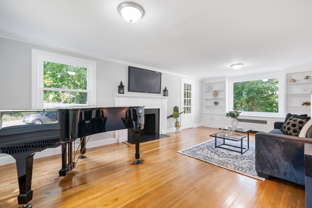 31 Terrace Drive Worcester, MA 01609 - Photo 3 of 42 a living room with furniture a fireplace and a flat screen tv