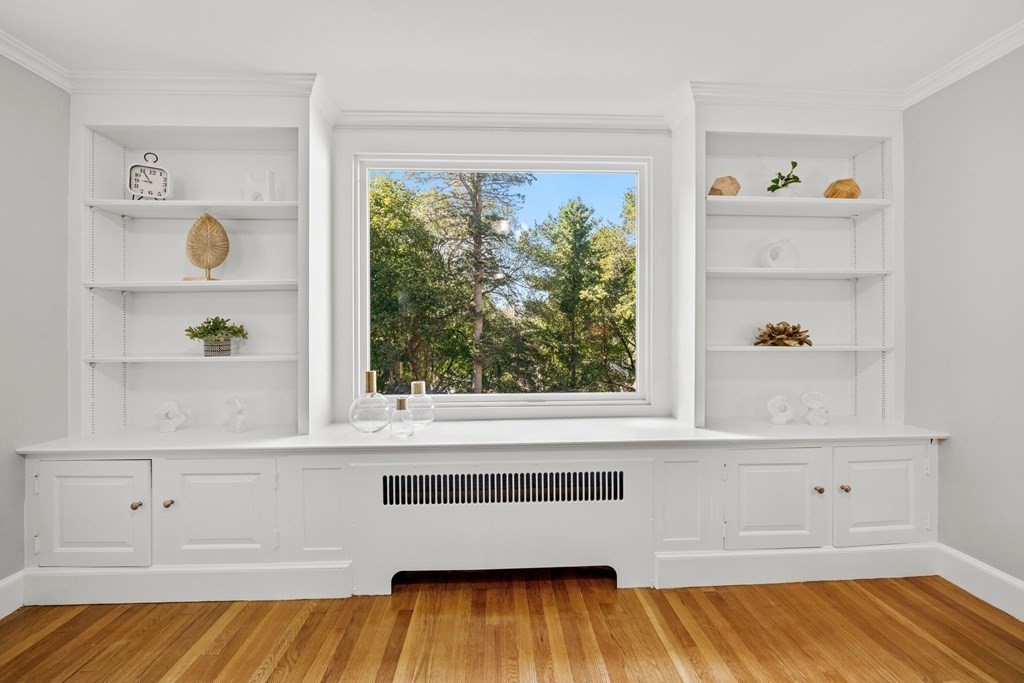 31 Terrace Drive Worcester, MA 01609 - Photo 4 of 42 a view of a bedroom with wooden floor and windows