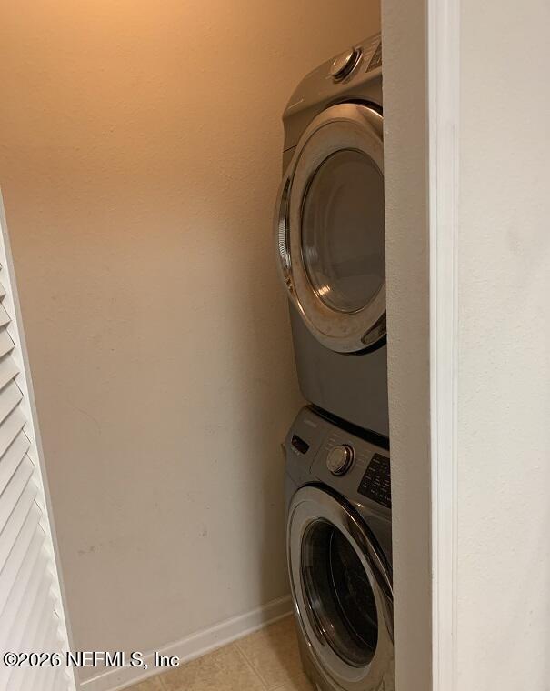 3631 Kirkpatrick Circle, Unit 6 Jacksonville, FL 32210 - Photo 12 of 14 a utility room with dryer and washer
