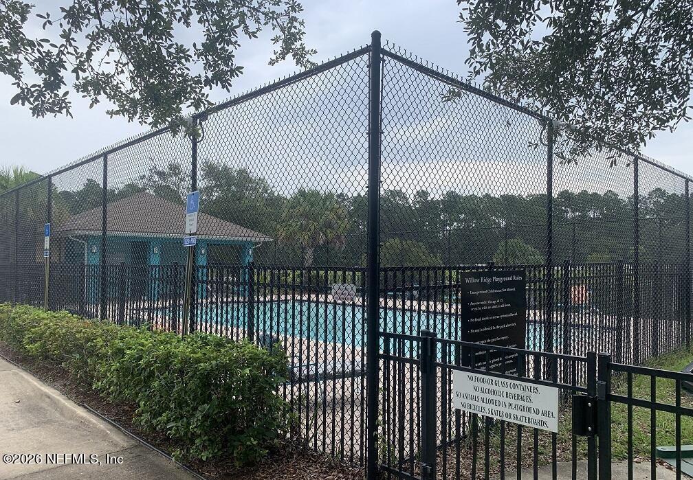 3631 Kirkpatrick Circle, Unit 6 Jacksonville, FL 32210 - Photo 14 of 14 a view of a wrought iron fences in front of house