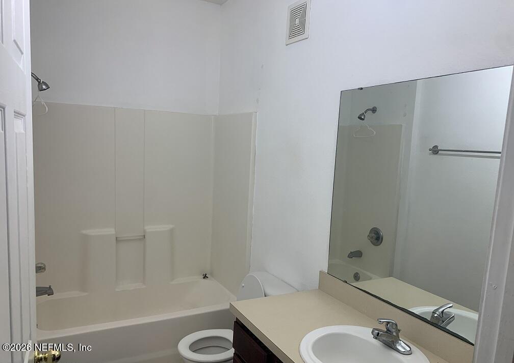 3631 Kirkpatrick Circle, Unit 6 Jacksonville, FL 32210 - Photo 8 of 14 a bathroom with a tub and a sink